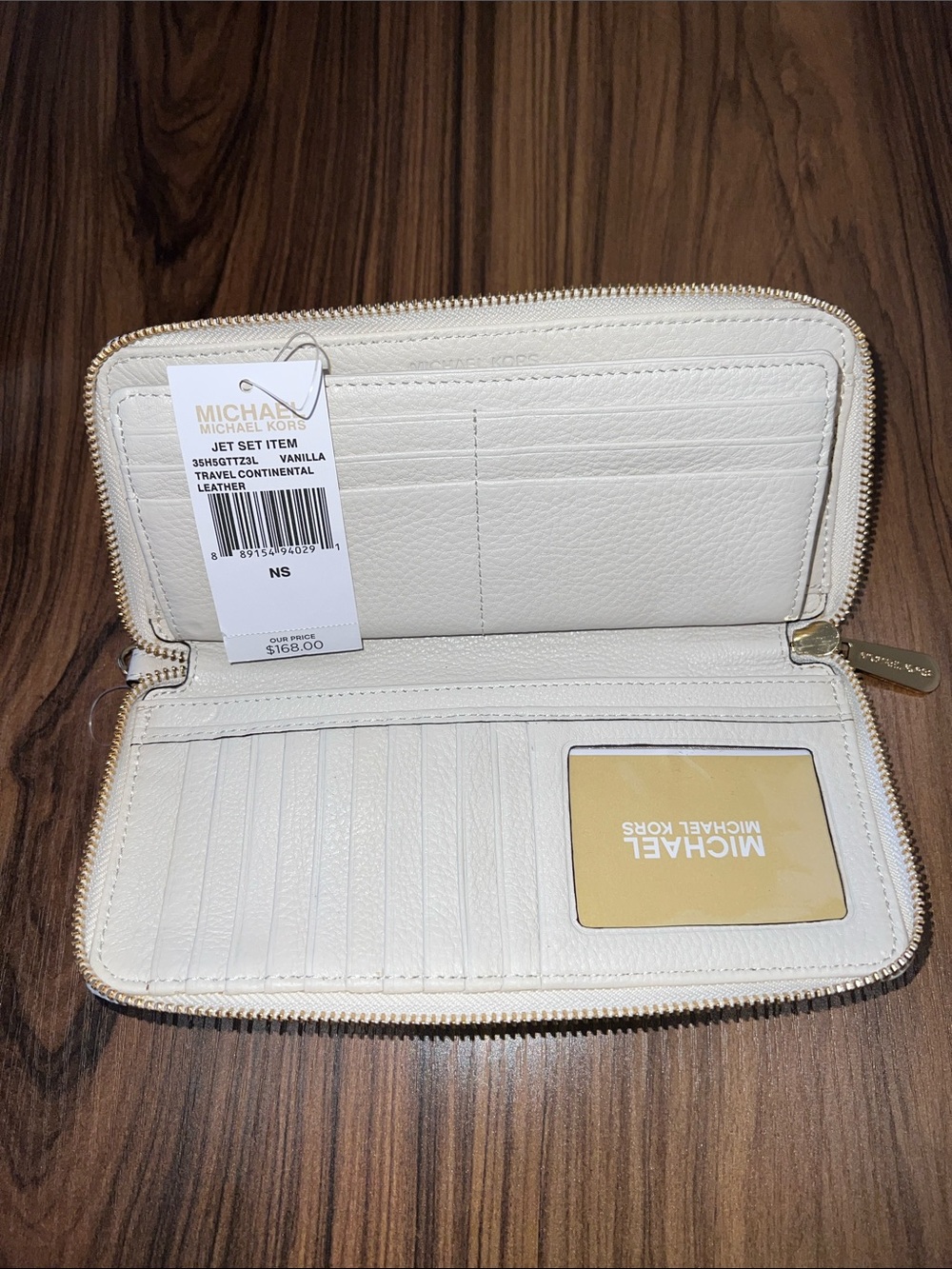 AUTH MICHAEL KORS Cream Leather Wristlet Wallet - Gold Plate